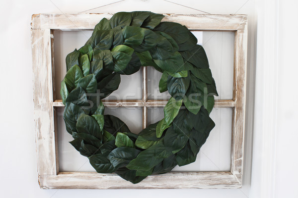 Magnolia Leaf Wreath over Old Window Stock photo © StephanieFrey