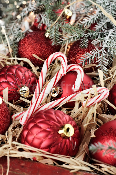 Candy Canes and Red Christmas Ornaments Stock photo © StephanieFrey