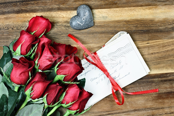 Dozen Roses with Old Letters Stock photo © StephanieFrey