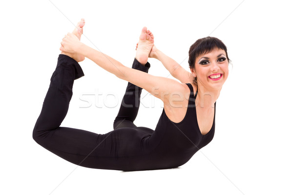 Fiatal mosolyog akrobata pózol izolált fehér Stock fotó © stepstock