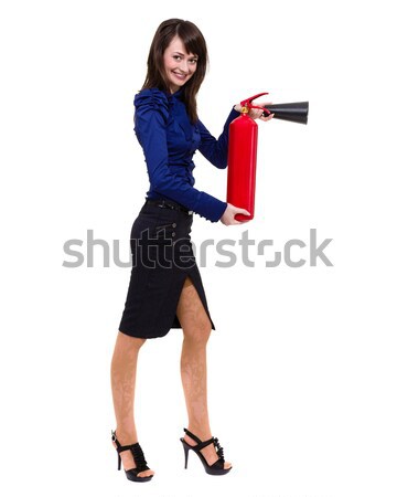 young businesswoman using a fire extinguisher Stock photo © stepstock