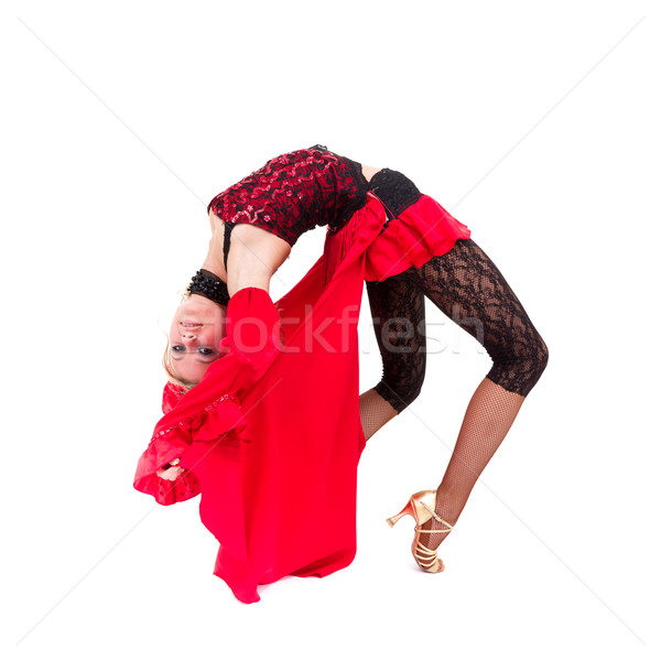 Young smiling acrobat posing Stock photo © stepstock