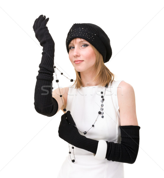 knitwear. woman wearing a winter cap and gloves with black necklace Stock photo © stepstock