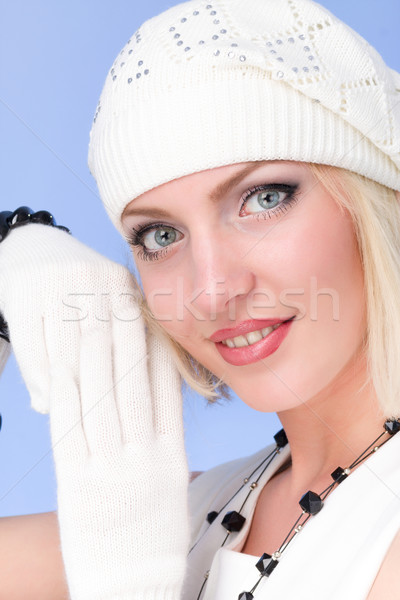 knitwear. woman wearing a winter cap and gloves closeup Stock photo © stepstock