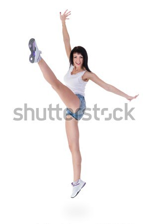 Giovani sorridere fitness donna gesto isolato Foto d'archivio © stepstock
