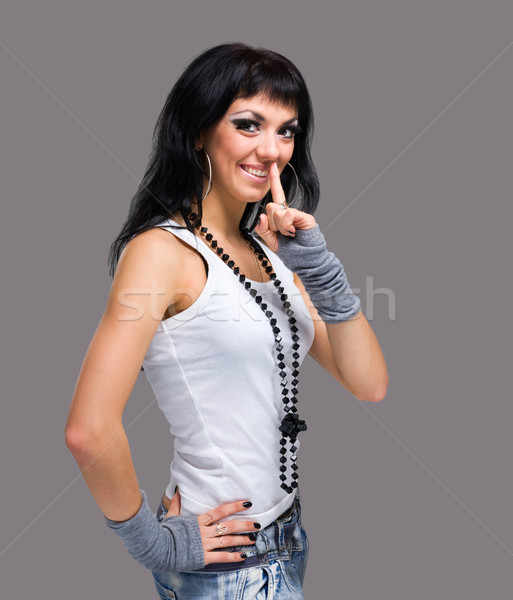 young woman with silence gesture Stock photo © stepstock