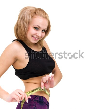 woman measuring her waist Stock photo © stepstock