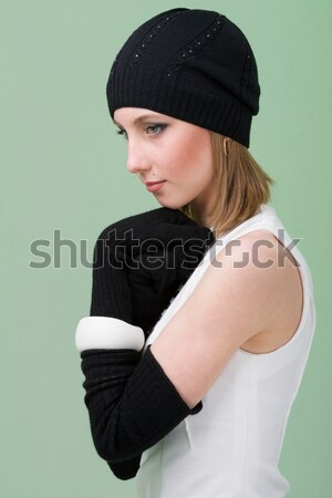 knitwear. young woman wearing a winter cap Stock photo © stepstock