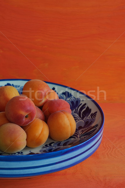 Bowl with apricots Stock photo © stickasa