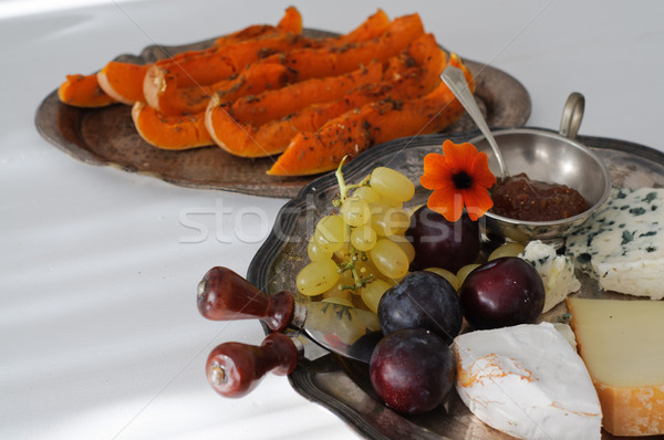 Cheese plate with fall fruits and pumpkin Stock photo © stickasa