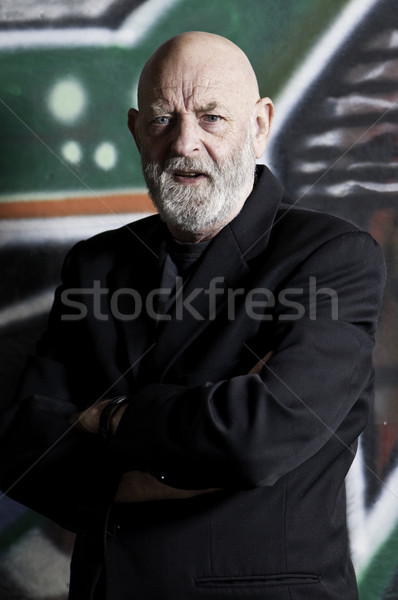 Arme gefaltet Mann tragen schwarz Sport Stock foto © stockfrank