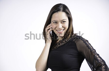 Femme parler téléphone jeune femme souriant mixte [[stock_photo]] © stockfrank