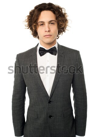 Handsome young bridegroom looking away Stock photo © stockyimages