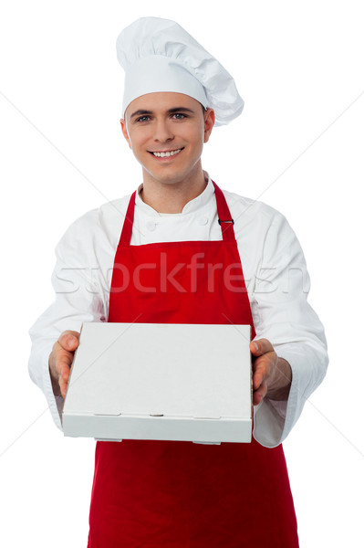 Jóvenes masculina chef pizza rojo uniforme Foto stock © stockyimages