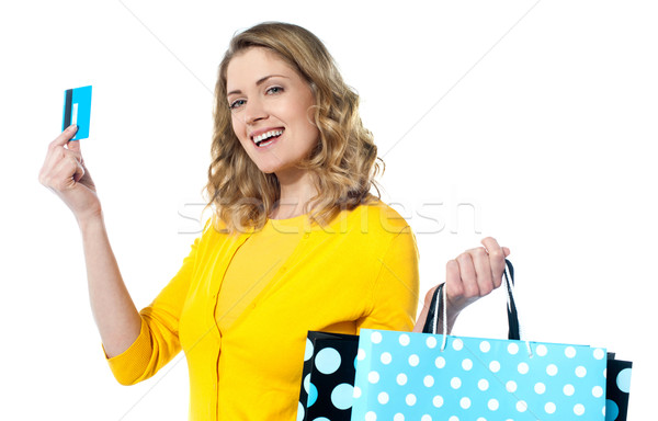 Atrakcyjna kobieta karty kredytowej odizolowany biały kobiet Zdjęcia stock © stockyimages