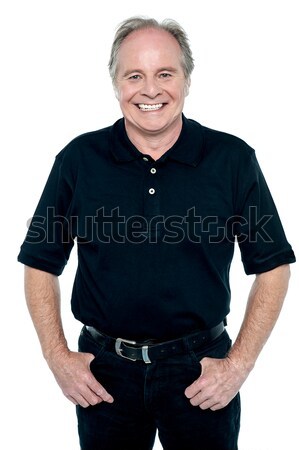 Profile shot of a casual smiling retiree Stock photo © stockyimages