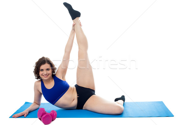 Gym instructor teaching warm up exercises Stock photo © stockyimages