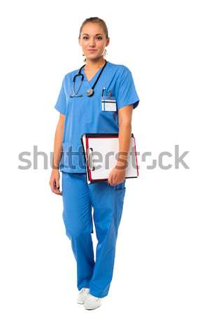 Elegante médico profissional uniforme feminino médico Foto stock © stockyimages