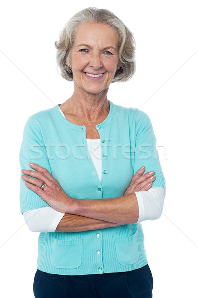 Old lady in casual wear posing confidently Stock photo © stockyimages