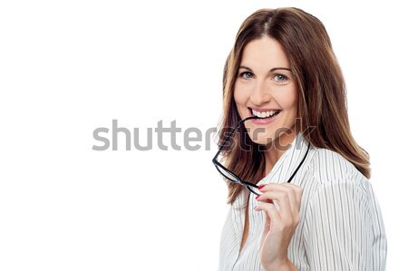 Smiling surprised pretty businesswoman Stock photo © stockyimages