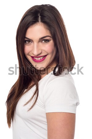 Casual woman posing over white Stock photo © stockyimages