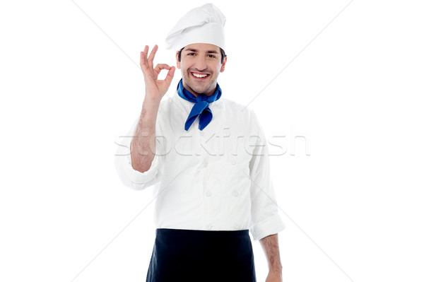 Lächelnd männlich Küchenchef Handzeichen Stock foto © stockyimages