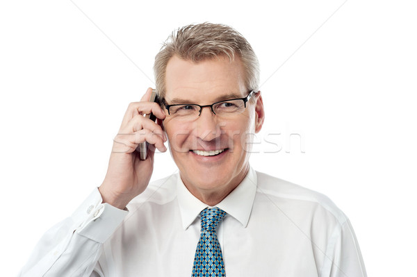 Gelukkig zakenman oproep glimlachend mannelijke Stockfoto © stockyimages