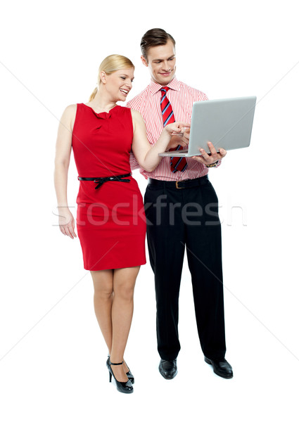 Női titkárnő mutat laptop főnök teljes alakos Stock fotó © stockyimages