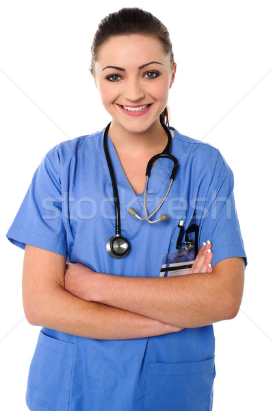 Jovem feminino médico senhora posando confiança Foto stock © stockyimages