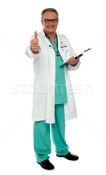 Thumbs up from senior medical professional Stock photo © stockyimages