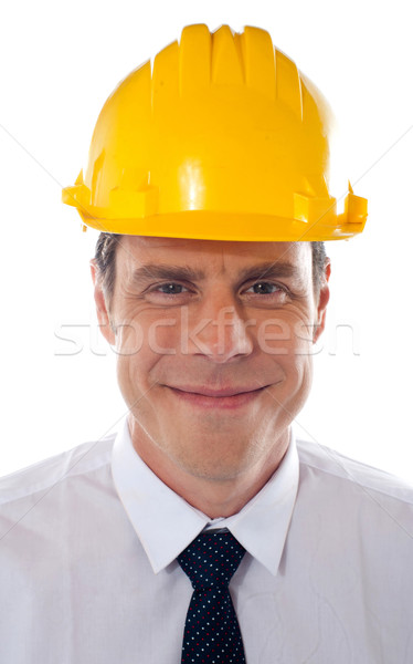 An architect wearing yellow safety helmet Stock photo © stockyimages