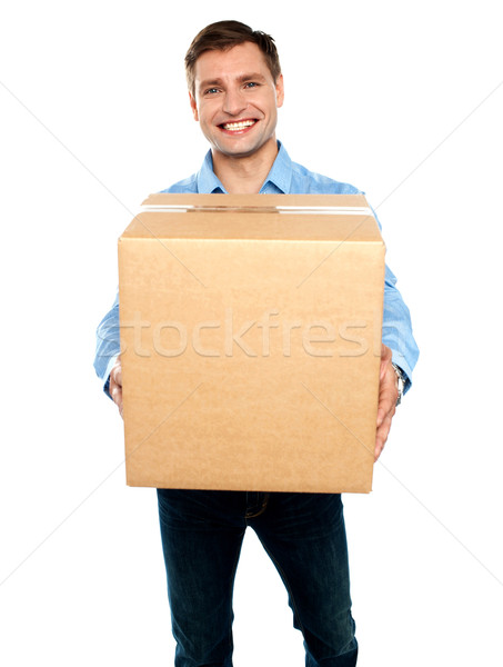Casual guy carrying packed cardboard boxes Stock photo © stockyimages