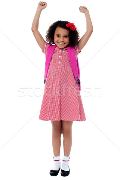 Enthousiast meisje poseren omhoog Stockfoto © stockyimages