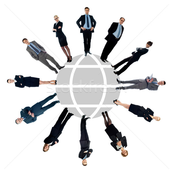 Business people around the world map Stock photo © stockyimages