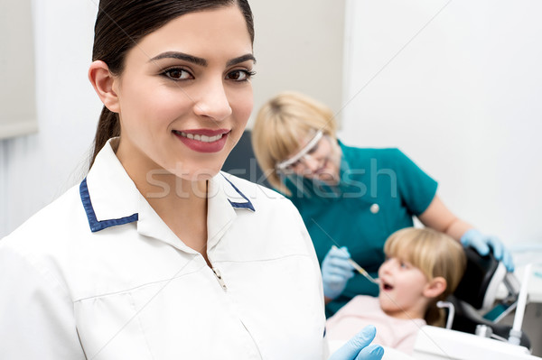 Little girl treated at dental clinic Stock photo © stockyimages