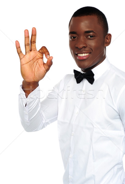 Young african boy showing okay gesture Stock photo © stockyimages