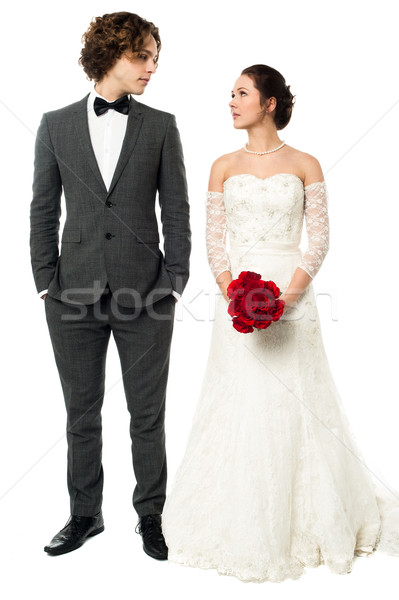 Stock photo: Gorgeous couple gazing into each others eyes