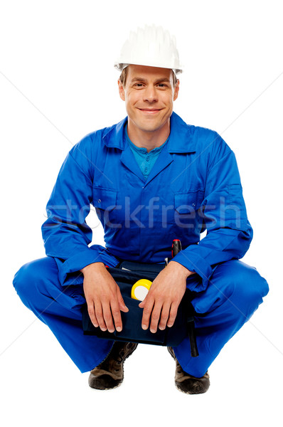 Smiling male worker wearing safety hat Stock photo © stockyimages