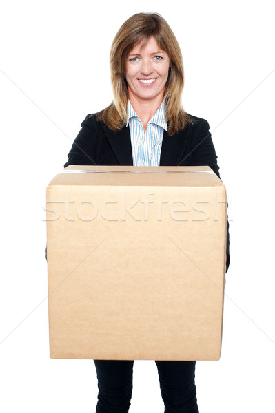 Business lady holding packed carton Stock photo © stockyimages