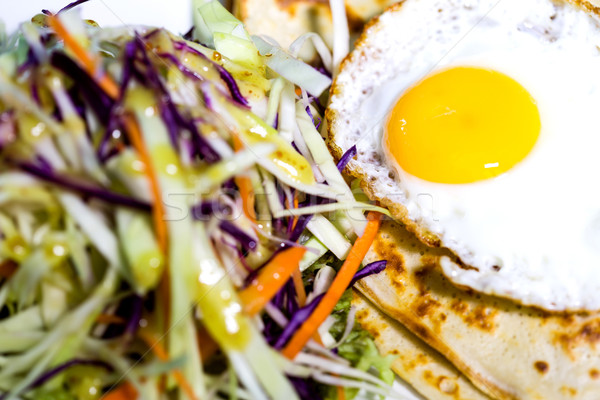 Fried egg and coleslaw, rich breakfast Stock photo © stockyimages