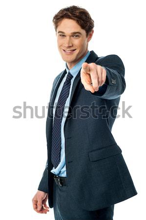 Businessman pointing towards camera Stock photo © stockyimages