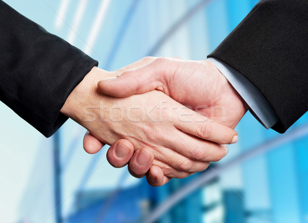 Business deal finalized, congratulations! Stock photo © stockyimages