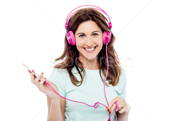 Comme chanson heureux femme musique [[stock_photo]] © stockyimages