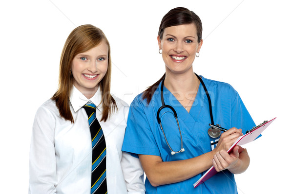 High school girl in doctors clinic Stock photo © stockyimages
