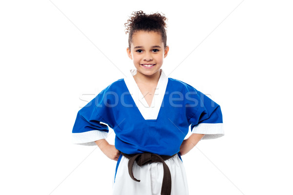 Lächelnd jungen Karate kid schauen Mädchen Stock foto © stockyimages