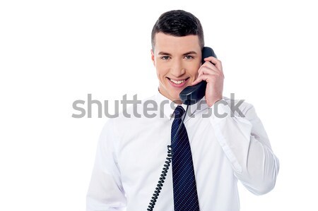 Jonge professionele telefoongesprek knap mannelijke uitvoerende Stockfoto © stockyimages
