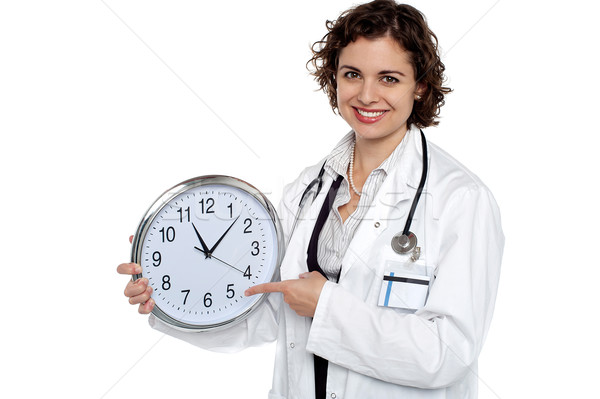 Foto stock: Bastante · médico · indicação · fora · tempo · parede