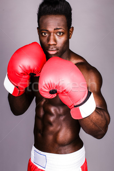 Muscular male boxer with serious look on face Stock photo © stockyimages