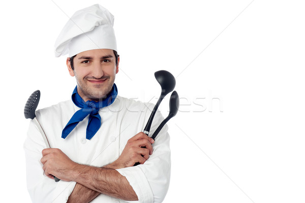 Stock photo: Chef holding kitchen essentials