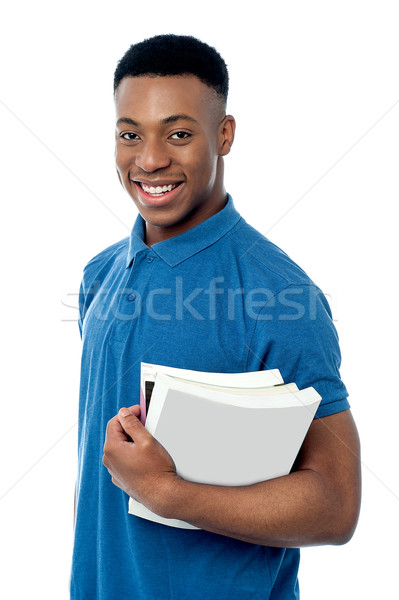 Handsome young college student Stock photo © stockyimages